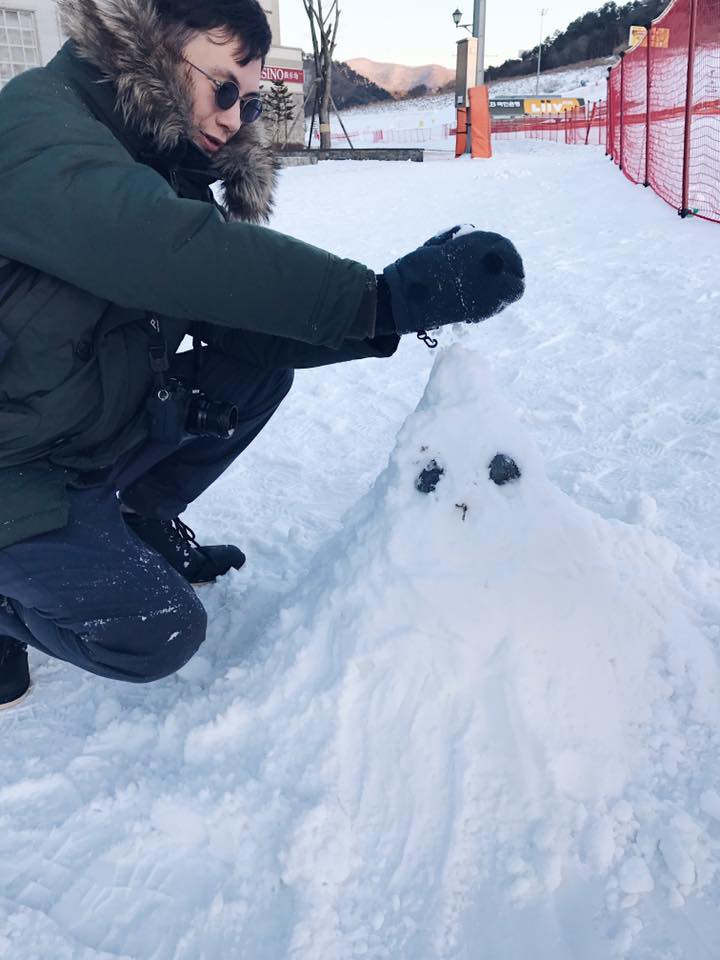 Building a snowman in Pyeongchang. Korea